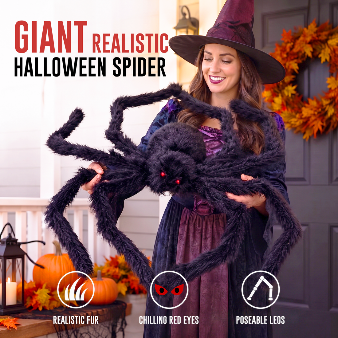 A woman in a witch costume holds a giant realistic black Halloween spider with red glowing eyes and poseable legs in front of a porch door. Large text reads 'GIANT REALISTIC HALLOWEEN SPIDER,' with feature icons for realistic fur, chilling red eyes, and poseable legs.