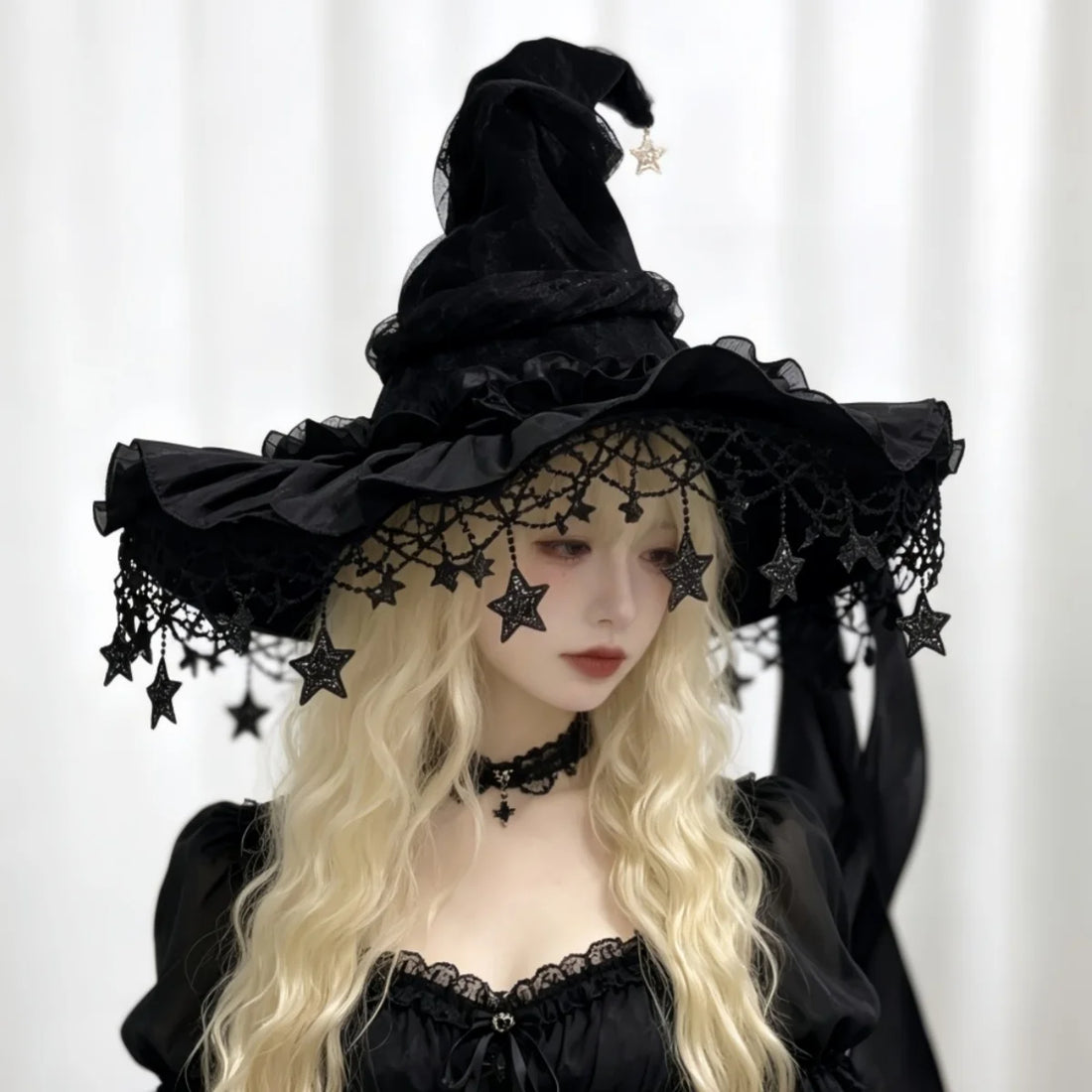 woman-wearing-velvet-witch-hat-star-charms-lace-veil-zaranss-mart